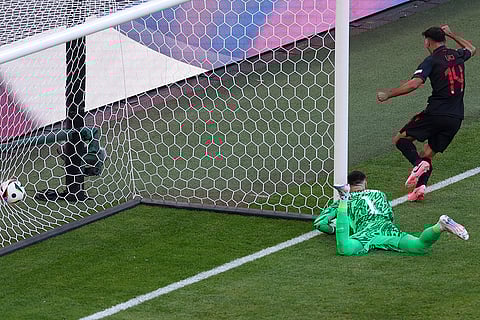 Qazim Laci scores a goal for Albania